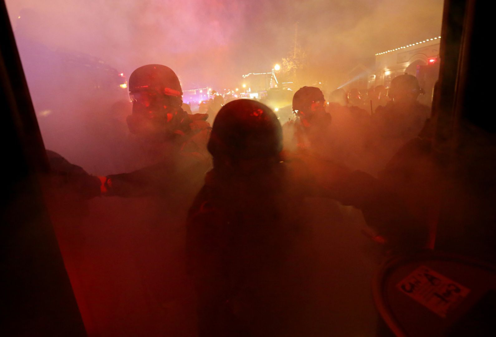 St. Louis County Police respond to crowds after grand jury announcement